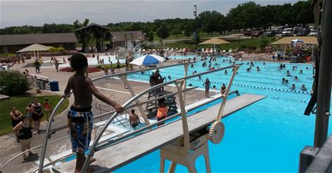 Young girl on the diving board