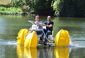 Cayden and WIBW-AM Britt on Water Trike