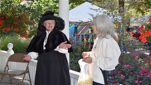 Two women in older century attire