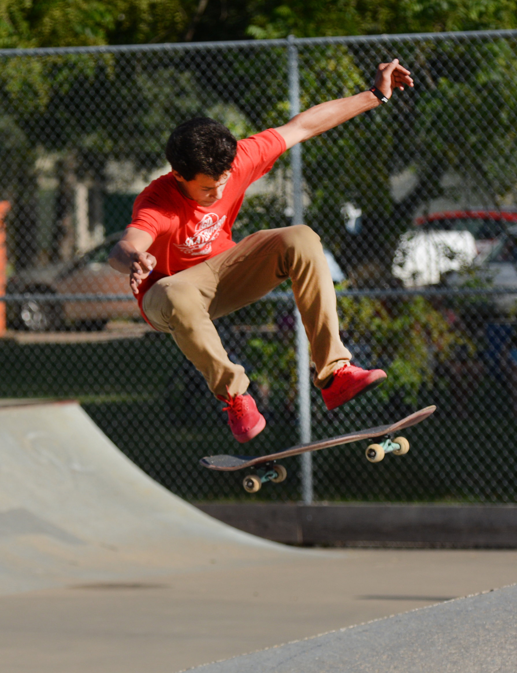 Competitor in Skateboard shirt in air